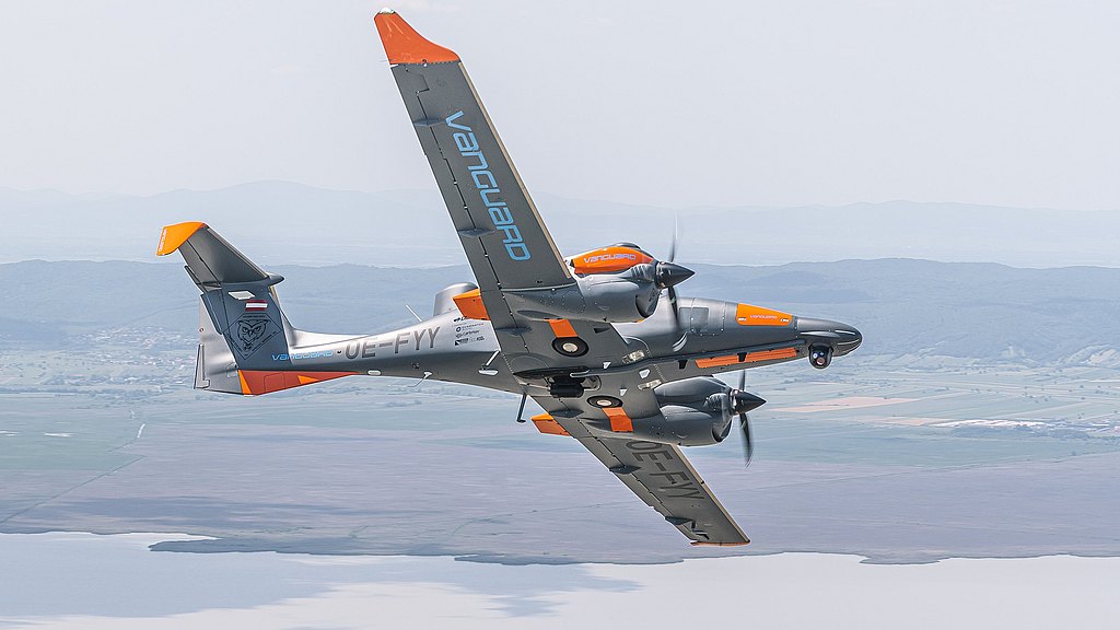 DA62 MPP Vanguard flying over a coast line.