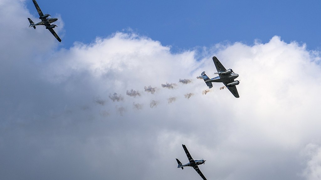 Formation flight of a DA50 RG, DA62, and a Beech 18.