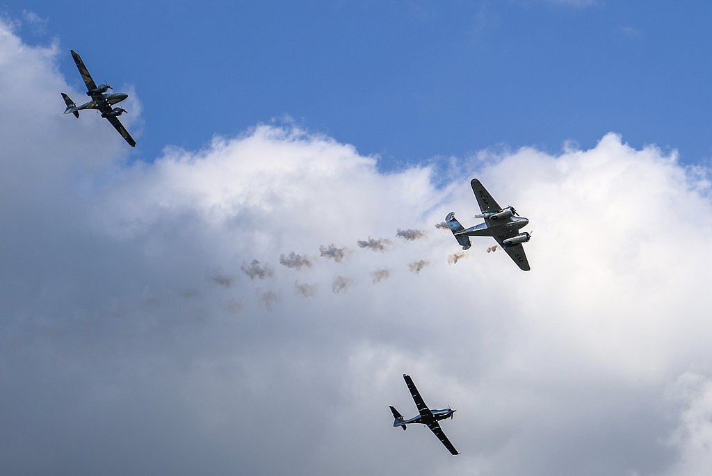 Formation flight of a DA50 RG, DA62, and a Beech 18.