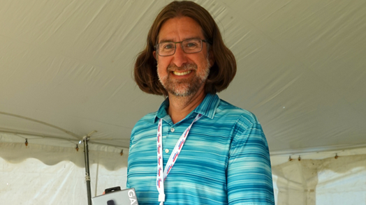 Man holding a Garmin product.
