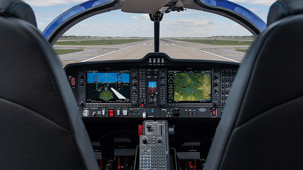 DA50 RG cockpit view with runway visible through the front window. 